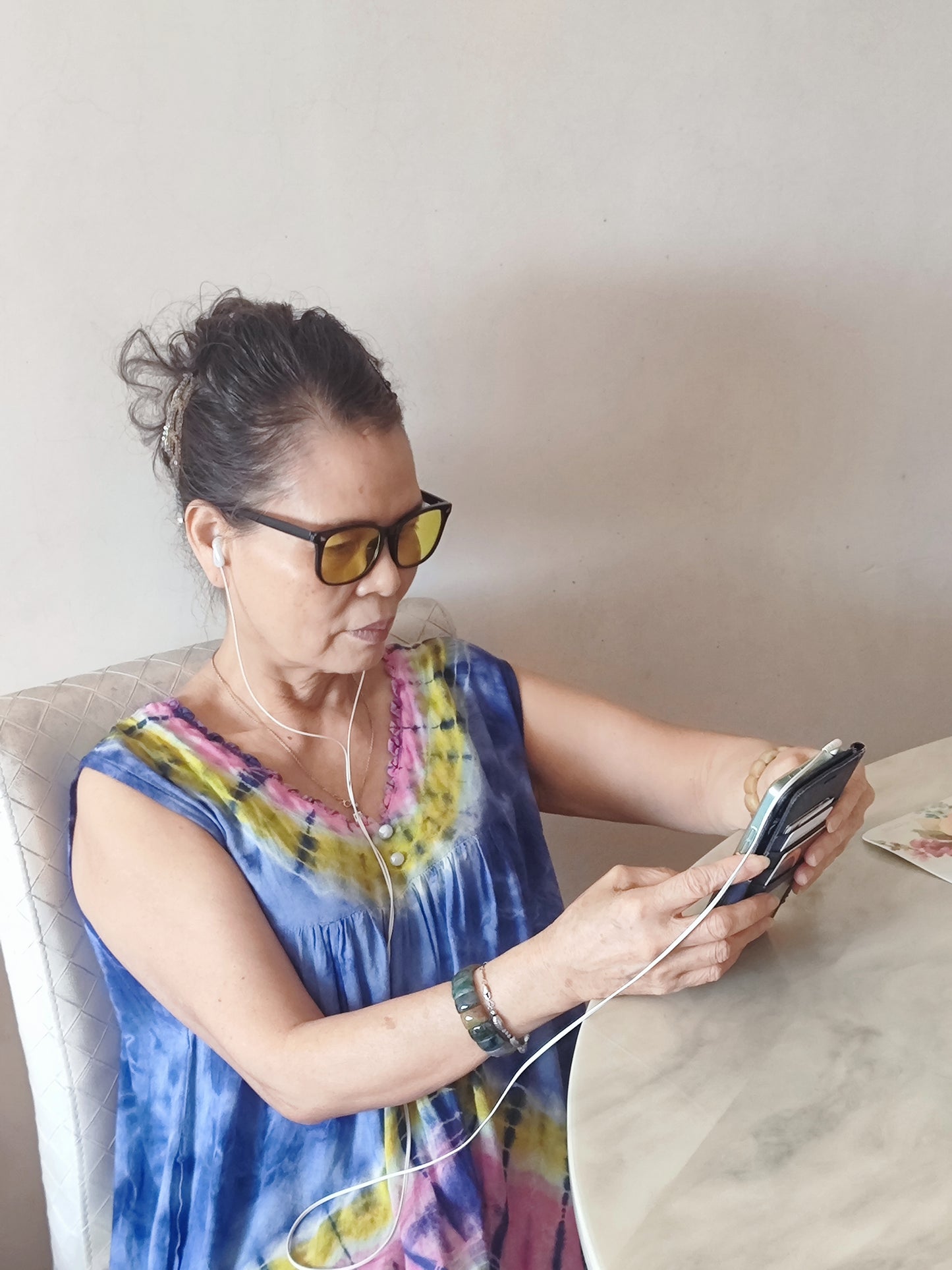 Using a Phone with Yellow-lensed Blue Light-Blocking Glasses