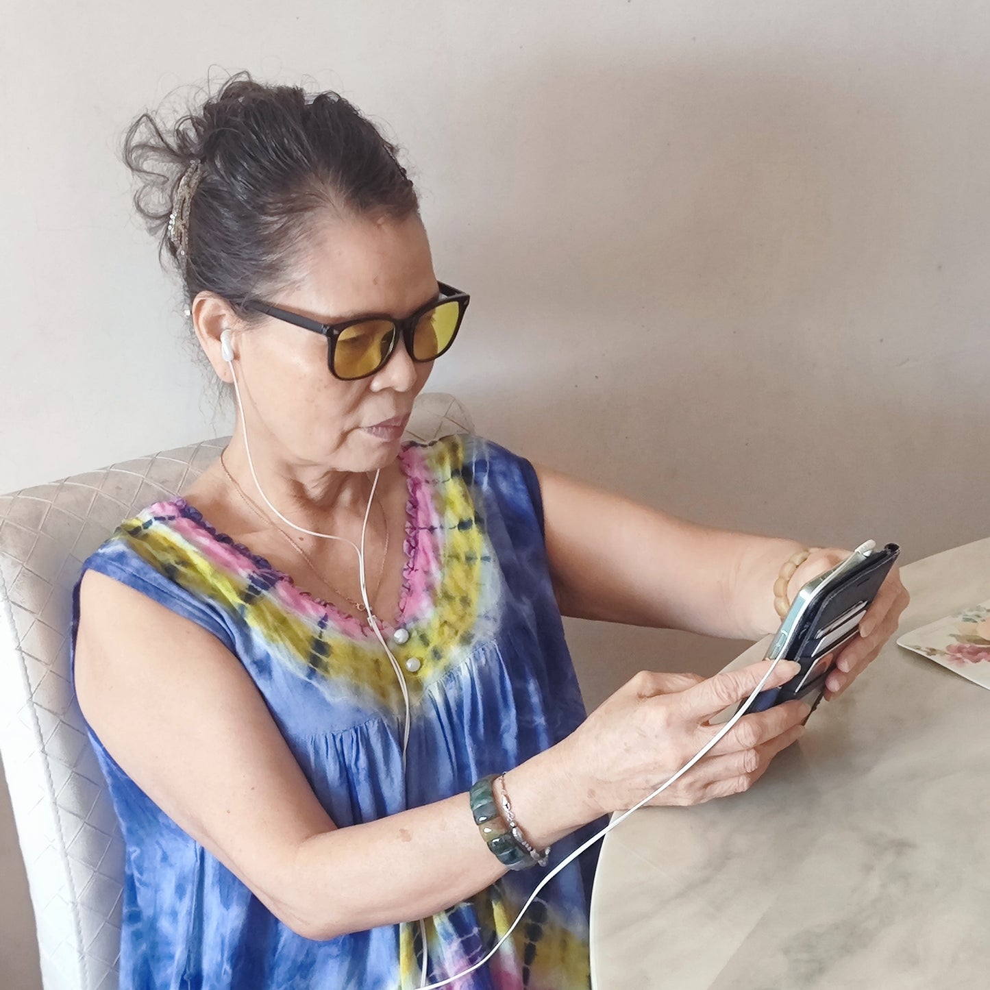 Using a Phone with Yellow-lensed Blue Light-Blocking Glasses