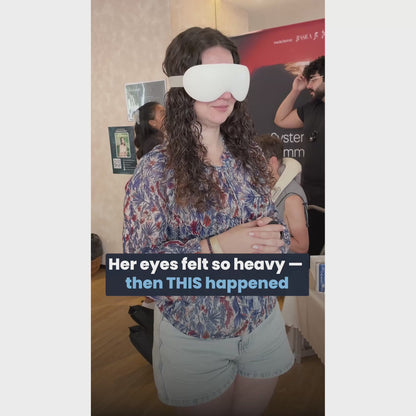 Female User trying our Dreamgaze eye massager for eye strain relief 