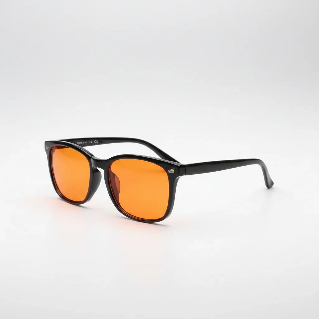 Black-framed blue light blocking glasses with orange lenses for digital eye strain relief